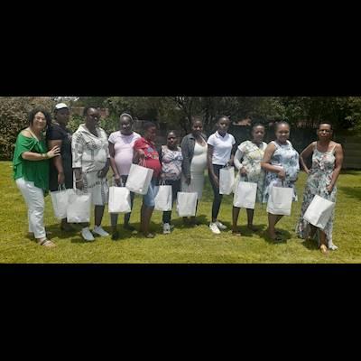 Caron Chairperson with expectant Moms
