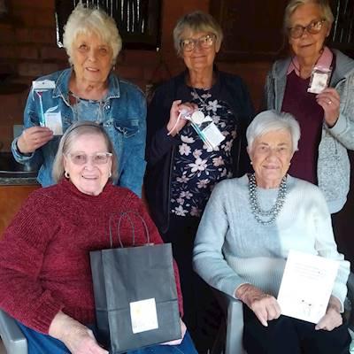Crafty Grans receiving a gift