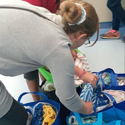 Girls in action to hand out GWC parcels