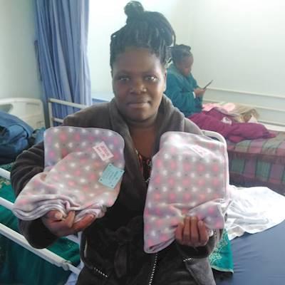Mom with twins receiving her parcel