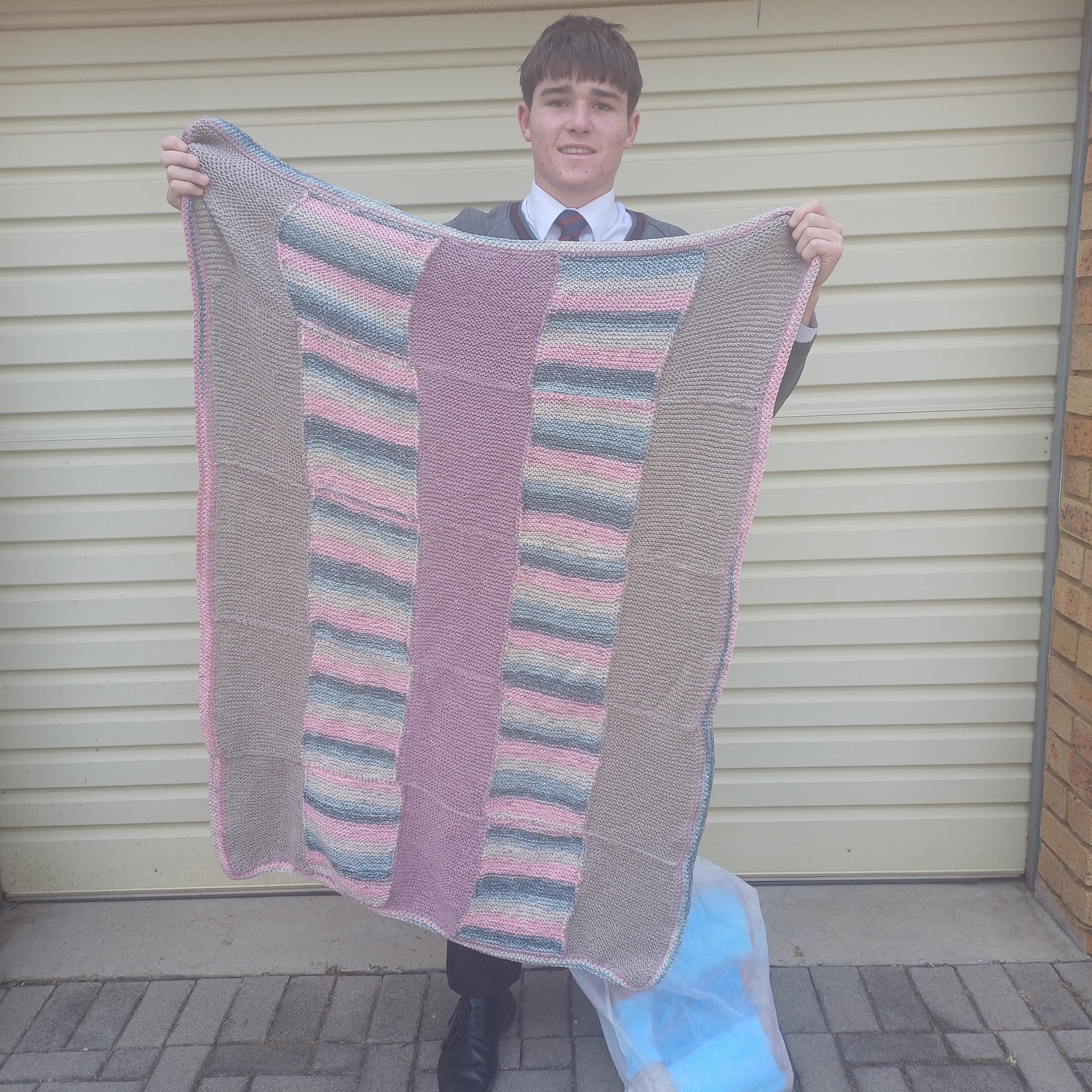 Adam Haselau from St Johns Community Hours Donation